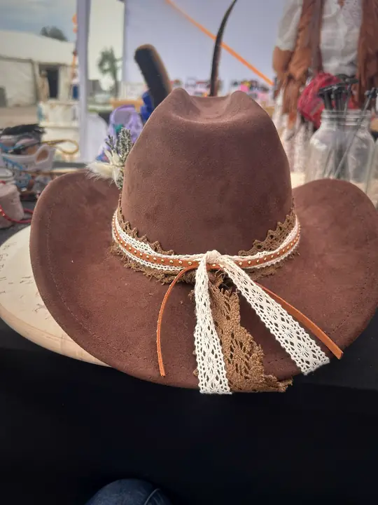 Brown hat with cream lace ties