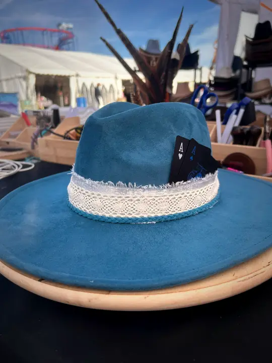Teal hat with frayed lace band